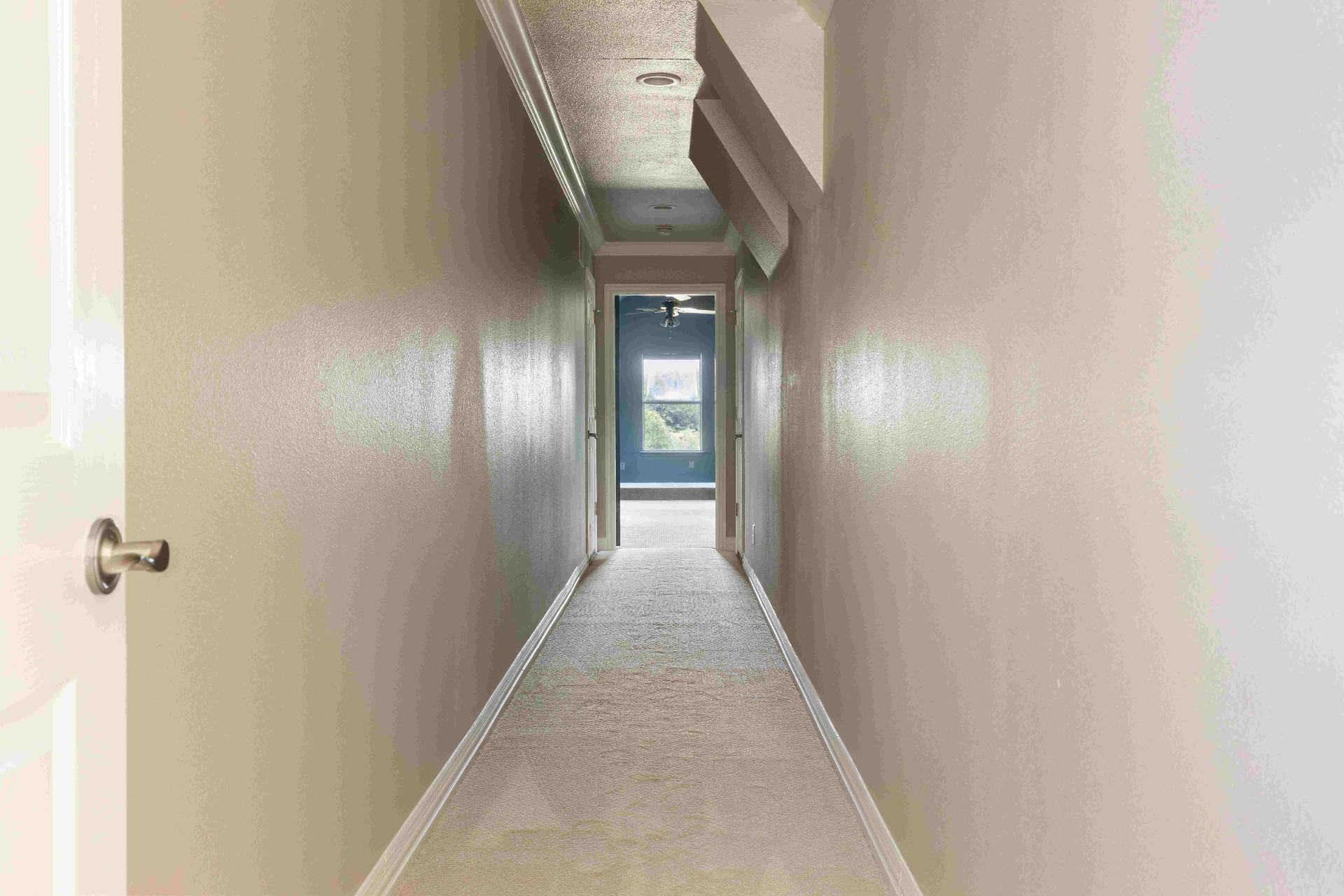 Upstairs hallway leading to secondary bedrooms